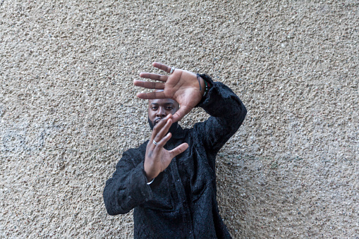 Portrait of afro men  making hand sign