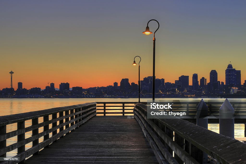 Seattle Skyline from the Pier at Sunrise Downtown Skyline from the Pier at Sunrise Beach Stock Photo