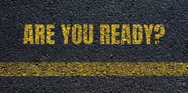 istock Are you ready? question lettering on asphalt road 1867233234