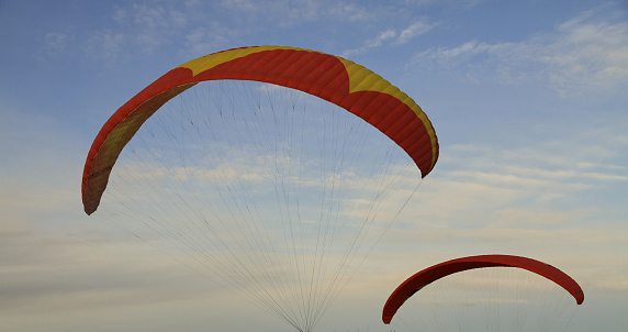 Two paragliders preparing to fly