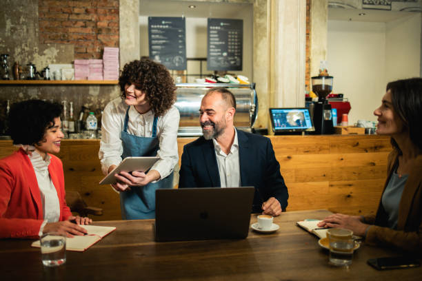 istock Business people making an order during their business lunch 1867236600