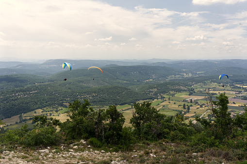 Extreme flying sport, over a valley in Provence