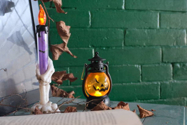 istock Table decoration for Halloween with Small jack-o-lantern lamp 1867246832
