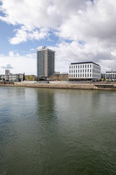 istock Skyline of modern riverside buildings with clouds 1867249504