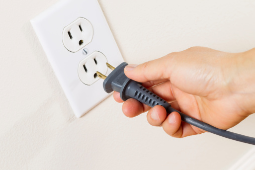 Inserting Power Cord Receptacle in wall outlet
