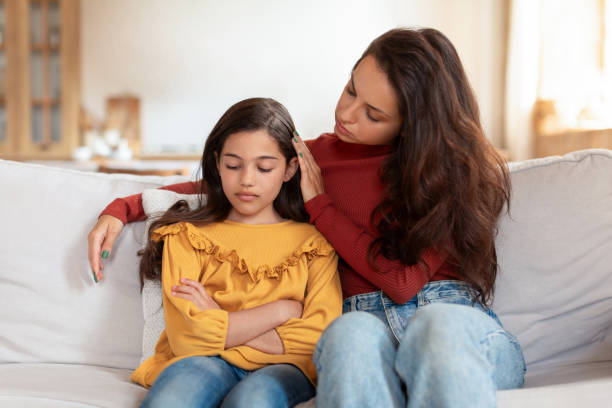 istock Arabic Mom Talking To Unhappy Daughter Supporting Her At Home 1867283083