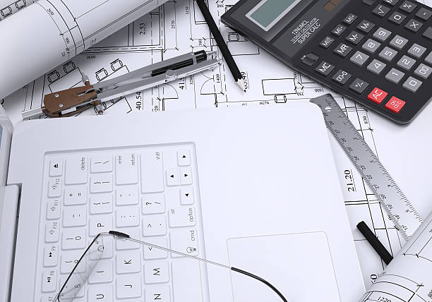 istock Calculator, paper and laptop 186728545