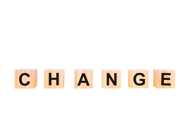 istock Placing a wooden cube block with the text 