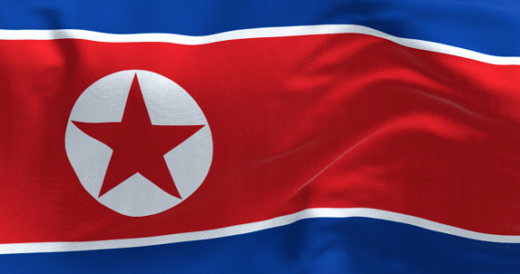 Close-up of North Korea national flag waving in the wind. 3d illustration render, Rippling fabric. Textured textile background