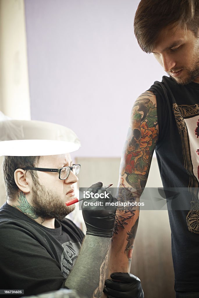 Progettazione di un tatuaggio - Foto stock royalty-free di Abilità