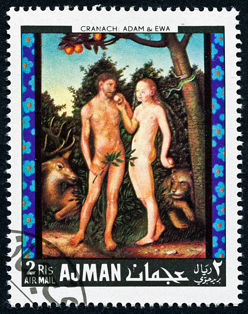Adam And Eve Stamp Cancelled Stamp From Ajman Featuring A Painting By Lucas Cranach Of Adam And Eve.  The Painting Was Made In 1531. adam and eve painting stock pictures, royalty-free photos & images