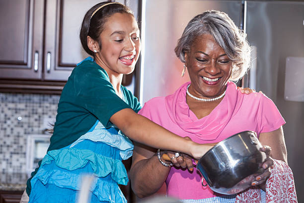 istock Girl baking with grandmother 186735372