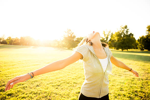 istock Happy woman at the park 186735436