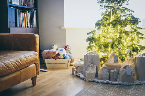 Eco-friendly Christmas wrapping with hessian sacks that can be use yearly