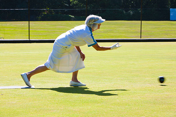 istock Senior lady lawn bowling on this sunny day 186736130
