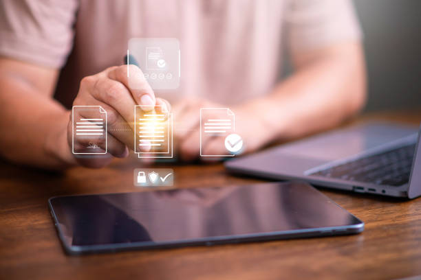 istock E-signing  paperless concept, businessman signing on electronic document for paperless office concept. online data management, approve, online database. 1867365670