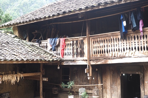 Ha Giang, Vietnam – 10.13.2023: The traditional wooden Hmong house featured in the movie ‘Pao’s Story’ (Chuyen cua Pao) in Lung Cam village