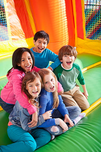 istock Children in bounce house 186737937
