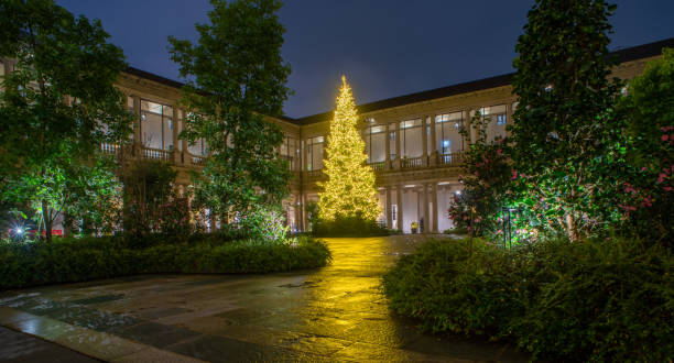 istock Cloister with garden and tree illuminated with LED 1867426746