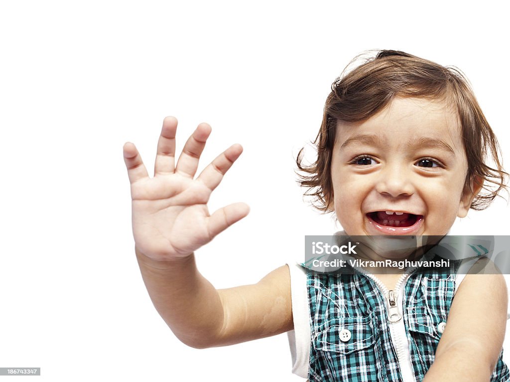 행복한 어린 인도어 남자아이 하위 손 흔드는 at 카메라 - 로열티 프리 손 흔들기 스톡 사진