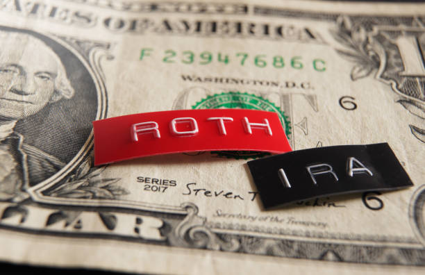istock Roth IRA labels macro on a dollar bill 1867435172