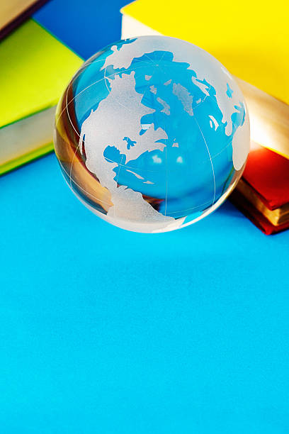 istock Globe paperweight with books: improve your general knowledge! 186743598