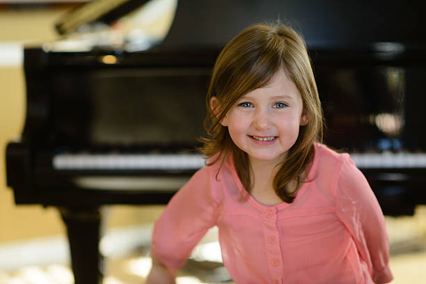 istock Girl with Piano 186743662