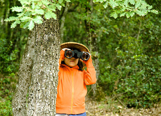 istock Scout little girl with binoculars 186744868