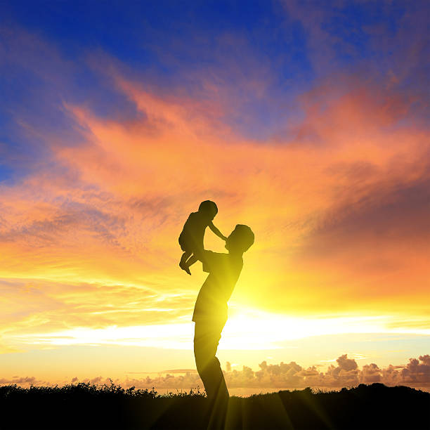 istock silhouette of happy dad and child 186745262