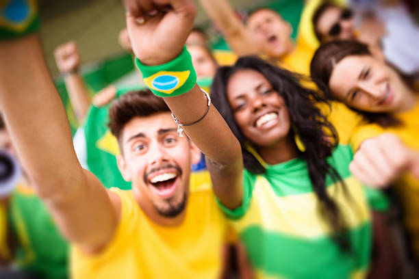 istock Group of brazilian supporters at stadium 186745364