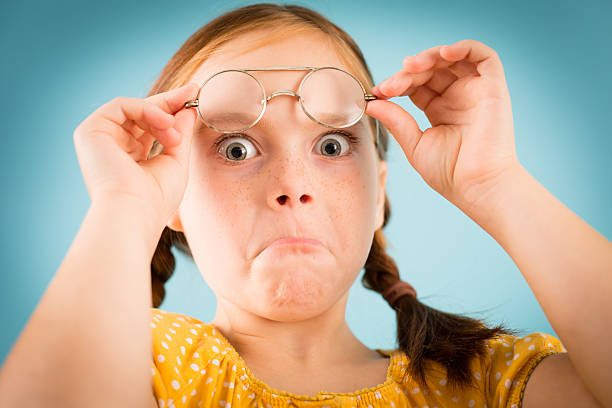 Young Girl, With Smug Expression, Wearing Vintage, Nerdy Eyeglasses