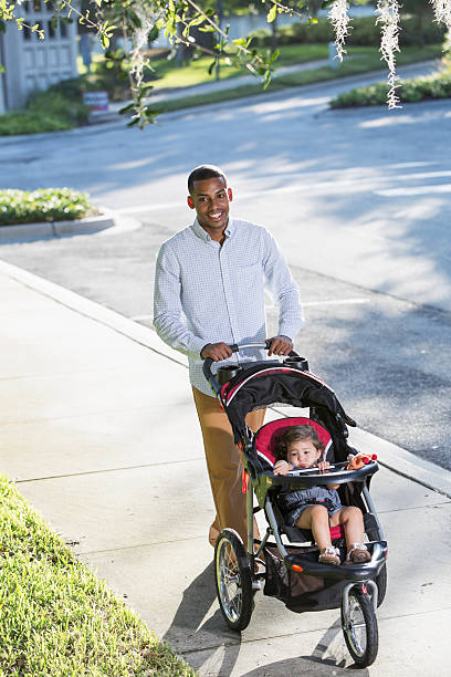istock Father and baby in stroller 186746616