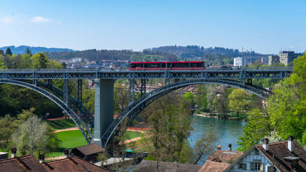 Iron bridge used by all types of vehicles on a sunny day.