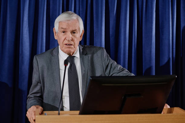istock Mature businessman giving his speech 1867477851