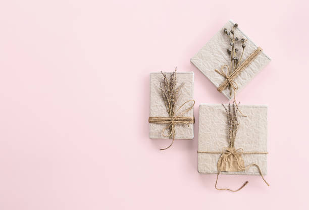 istock Ecological gift boxes decorated dried flowers. Zero waste holidays. 1867483648