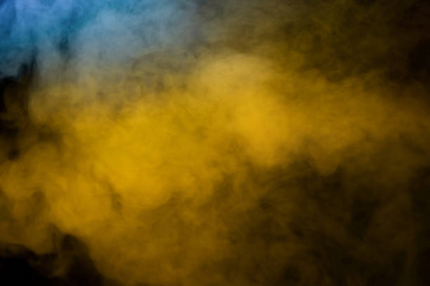istock Blue and yellow steam on a black background. 1867483678