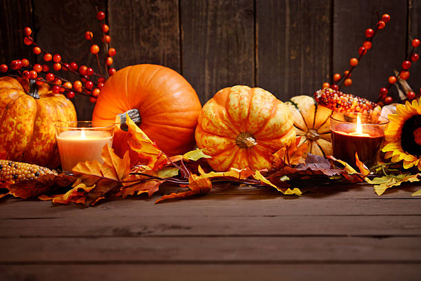 istock Autumn decoration with maple leaves and pumpkins on old woods 186748990