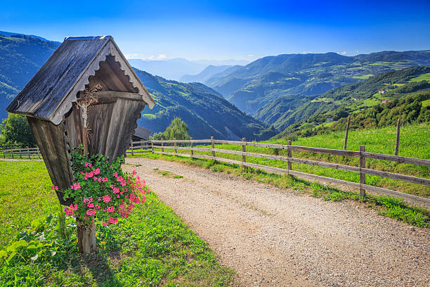 Christian wayside shrine near Tiers in the Dolomites region of the European Alps, South Tyrol, Italy.