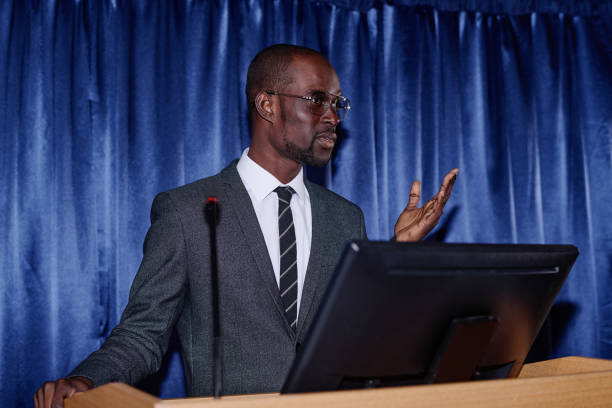 istock Businessman presenting his speech at conference 1867493562