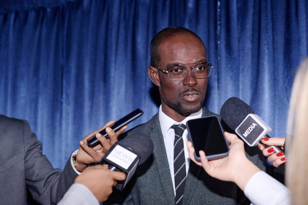 Businessman giving an interview to journalists