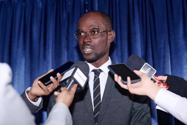 istock Politician giving an interview to journalists 1867494069