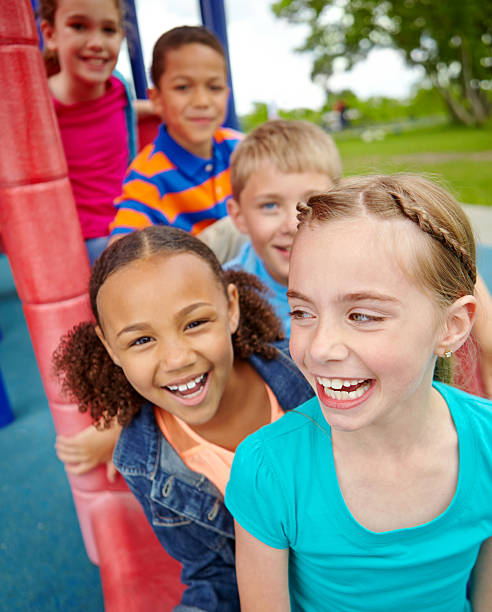 istock A group of diverse children on a playground 186749920