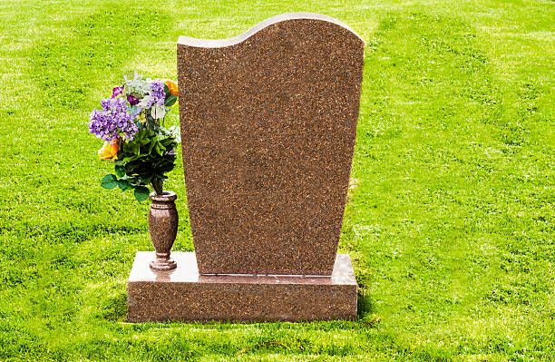 istock Tombstone with Flowers 186750245