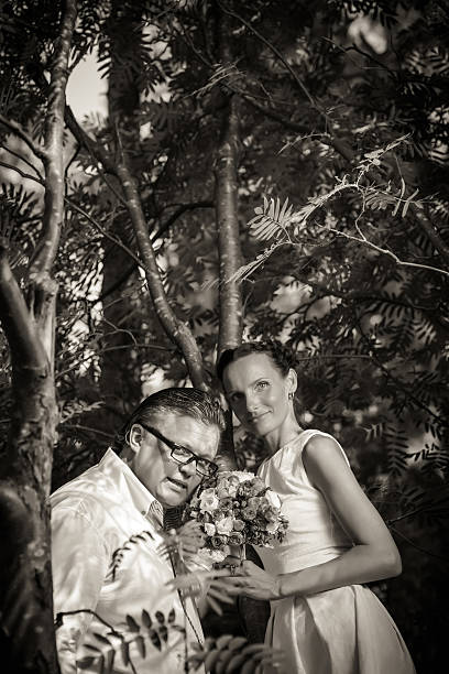 istock Newlyweds in the forest 186750249