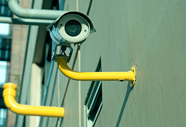 istock Surveillance camera on apartment building in downtown Seattle WA 186750415