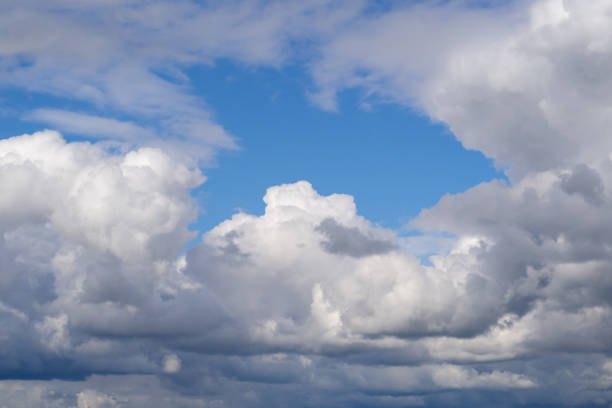 Cloudy sky. Blue sky with lots of cumulus clouds