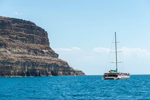 Recreational boat off the coast near Puerto Mogán, in Gran Canaria