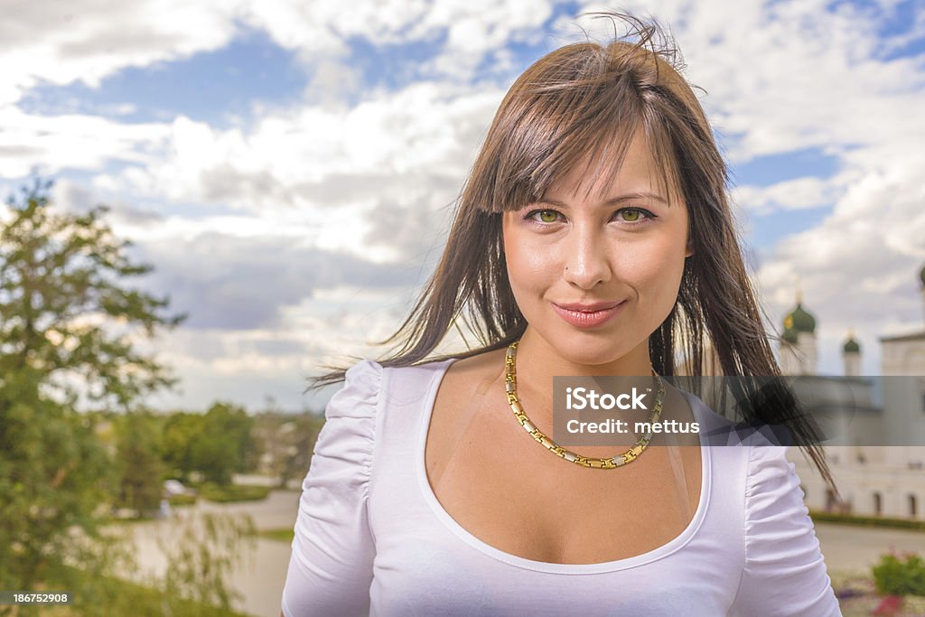 CloseUp Portrait Smiling Brunette Woman Outdoors Closeup portrait of a happy young woman looking culm and happy 30-34 Years Stock Photo