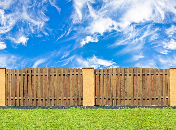istock traditional brown pine wooden fence 186754193