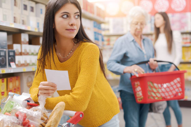 istock Young woman doing grocery shopping 1867552423